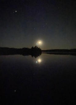 Night sky reflection on Fortune Lake Michigan